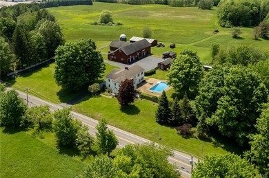 A closer aerial view showing some of the barns and