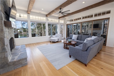 The living room is anchored by a striking floor-to