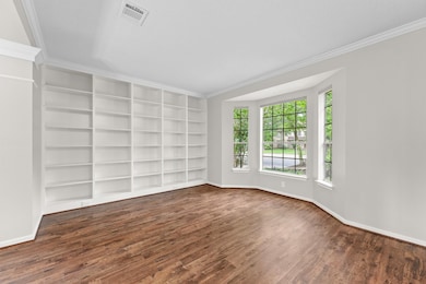 Front formal living room with views out to the fro