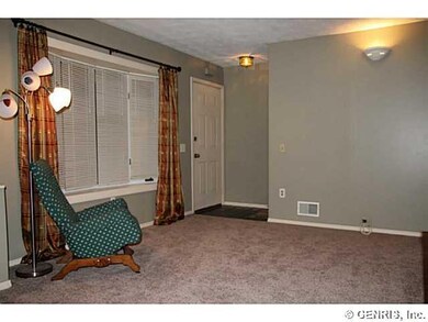 Foyer. The front entry with stairs straight ahead.