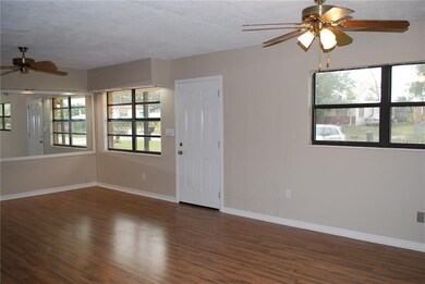Front door opening to Great Room. Laminate flooring.