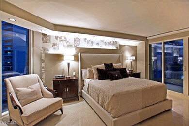 Bedroom featuring access to exterior and recessed