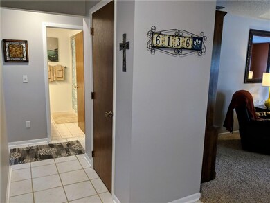 Tiled entry with large closet