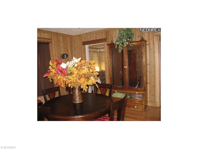 Formal dining room hardwood floors, cedar walls..b