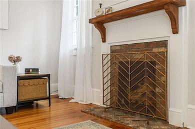 New fireplace with masonry surround.