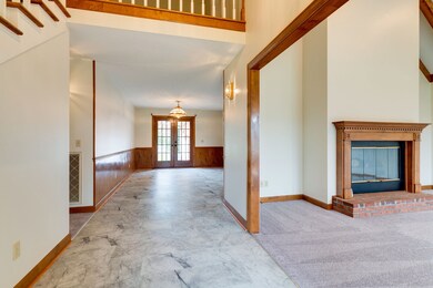 Brand new flooring in foyer and leading into the dining area