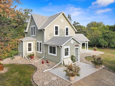This 1900's farmhouse was completely rebuilt from the studs with hand-crafted details and modern finishes, including hickory floors, knotty pine stairs, custom barn style doors, and galvanized accents throughout.