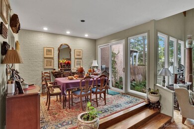 Dining room with hardwood / wood-style flooring an