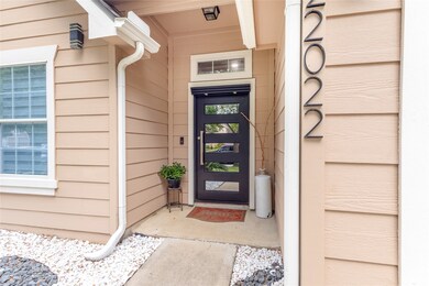 Inviting and stylish entrance with modern door des