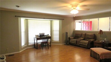 Living room looking toward the front door and foye