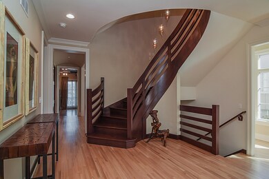 Entry with custom staircase is a beautiful stateme