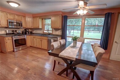 Great open concept eat-in kitchen with oak cabinet