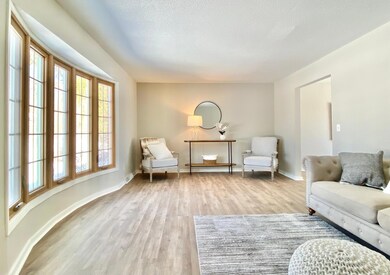 Upon walking in, you are greeted with a well lit family room with bay window!