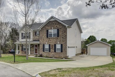 2 Car attached and oversized 1 car detached w/ workshop