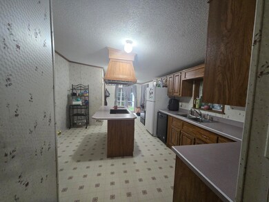 334 Costello Rd, Gardiner, ME 04345 - photo 5