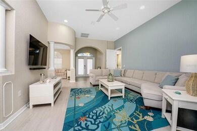 Soothing coastal colors and volume ceilings create a welcoming ambiance.