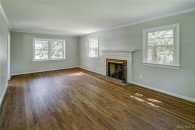 the living room also offers a wood burning firepla