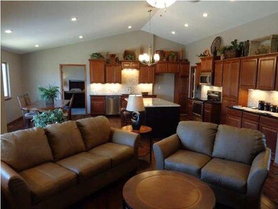 Vaulted great room with so many can lights, its li
