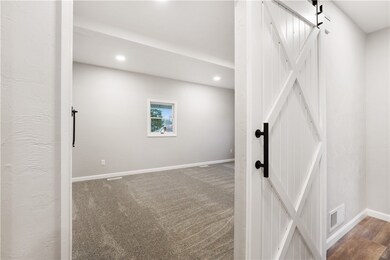BARN DOORS THAT LEAD INTO MASTER BEDROOM~