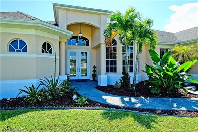 Elegant Entrance With Lava Rock Gardens and Fountain Pond