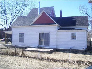 Side of house with patio.