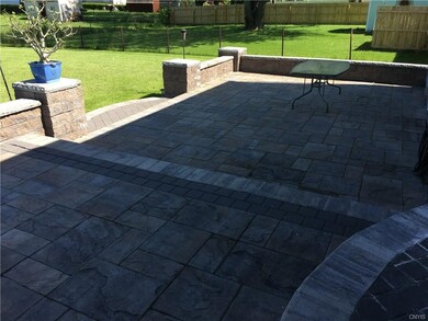 Gorgeous patio out back to enjoy the large, fenced