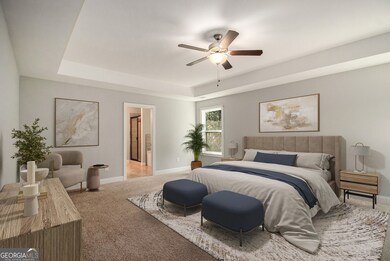 Upstairs, the Primary Suite is an Elegant Retreat with a Tray Ceiling, Sitting Area, and a Spa-Like Bathroom complete with a Double Stone Vanity, Soaking Tub, Separate Shower, and an Oversized Walk-In Closet