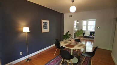 Fantastic formal dining room carrying the hardwood