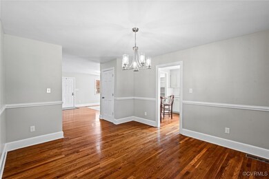 Unfurnished dining area featuring hardwood / wood-