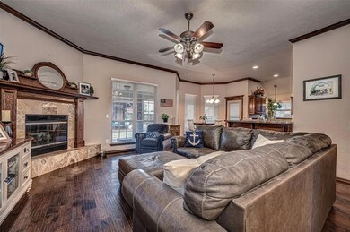 Living room with ornamental molding, a premium fir