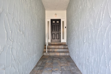 Covered entrance to home.