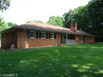 Exterior Front. Front Porch and sidewalk along entire front
