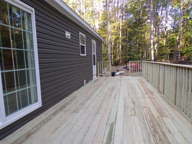 34 Riverwood Cir unit 11, Effingham, NH 03882 - photo 4