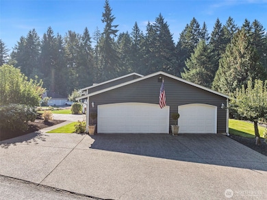 Side elevation of home, including 3 of the 5 garage doors.