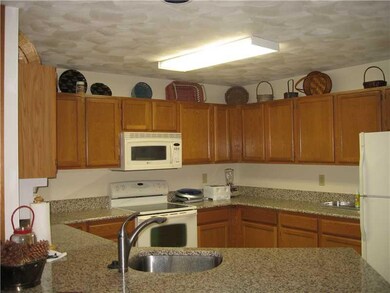 Kitchen. Kitchen with newer granite counter top.