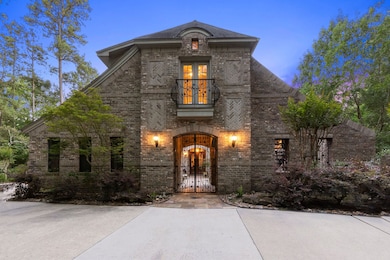 From the moment you drive up, you will notice the intricate wrought iron gates, doors and balustrades with hand crafted grape vines. Gated entry to the courtyard. Guest quarters are just above this entry equipped with a full bath!