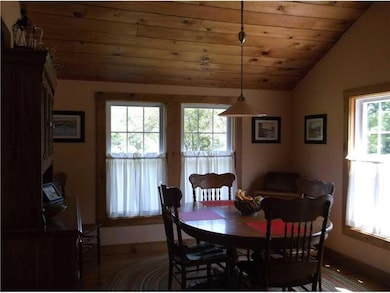 Dining Room. Cathedral ceiling in...