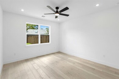 Empty room featuring light wood-style floors, a c