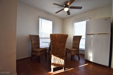 Dining room featuring a ceiling fan, plenty of nat