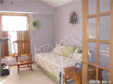 Bedroom. Front bedroom with walk in closet and ful