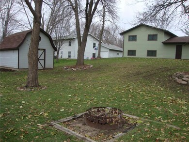 Fire pit area, shed and backyard