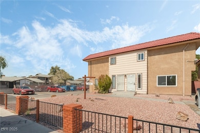 View of front facade with stucco siding