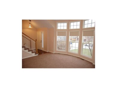 Living room boasts tons of natural lighting!