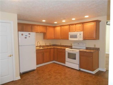 Kitchen. 2nd Floor unit has electric stove, first 