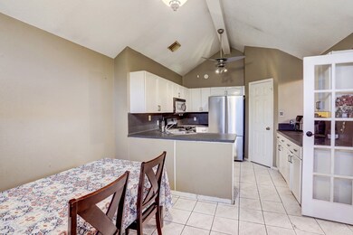 Dining room and Kitchen on the left as soon as you walk in the front door.
