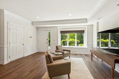 Large, bright entry with new luxury vinyl flooring.