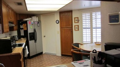 KITCHEN W/PANTRY, BREAKFAST NOOK & BAR.