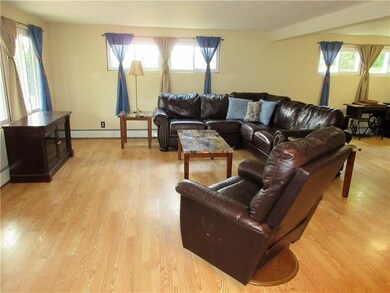The living room offers lots of natural light and i