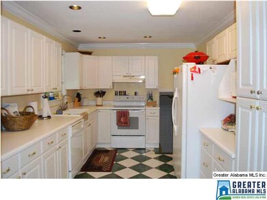 Here is a look through the kitchen.  White cabinet