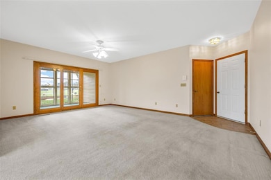 The white door on the right is the entry door and 
